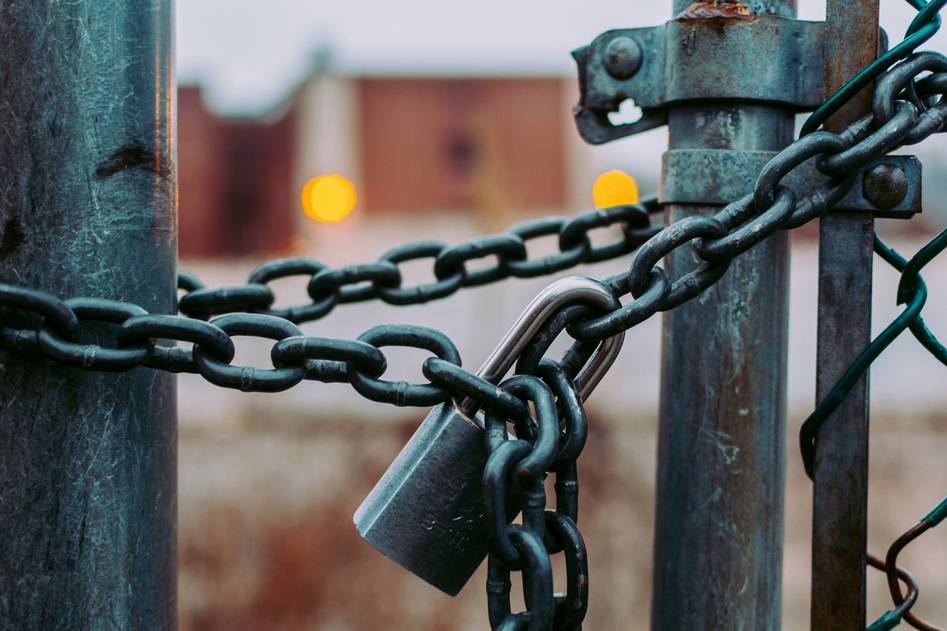 Secure home with locked door and insurance policy document